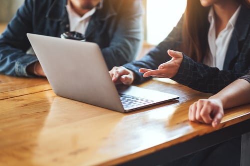 business-meeting-with-laptop-on-wooden-table-2026-03-17-17-36-24-utc