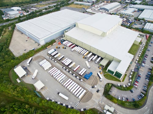 drone-shot-of-the-headquarters-of-a-factory-with-i-2026-01-11-09-43-39-utc