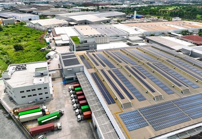 solar-powered-warehouse-facility-with-freight-truc-2026-01-07-06-58-12-utc